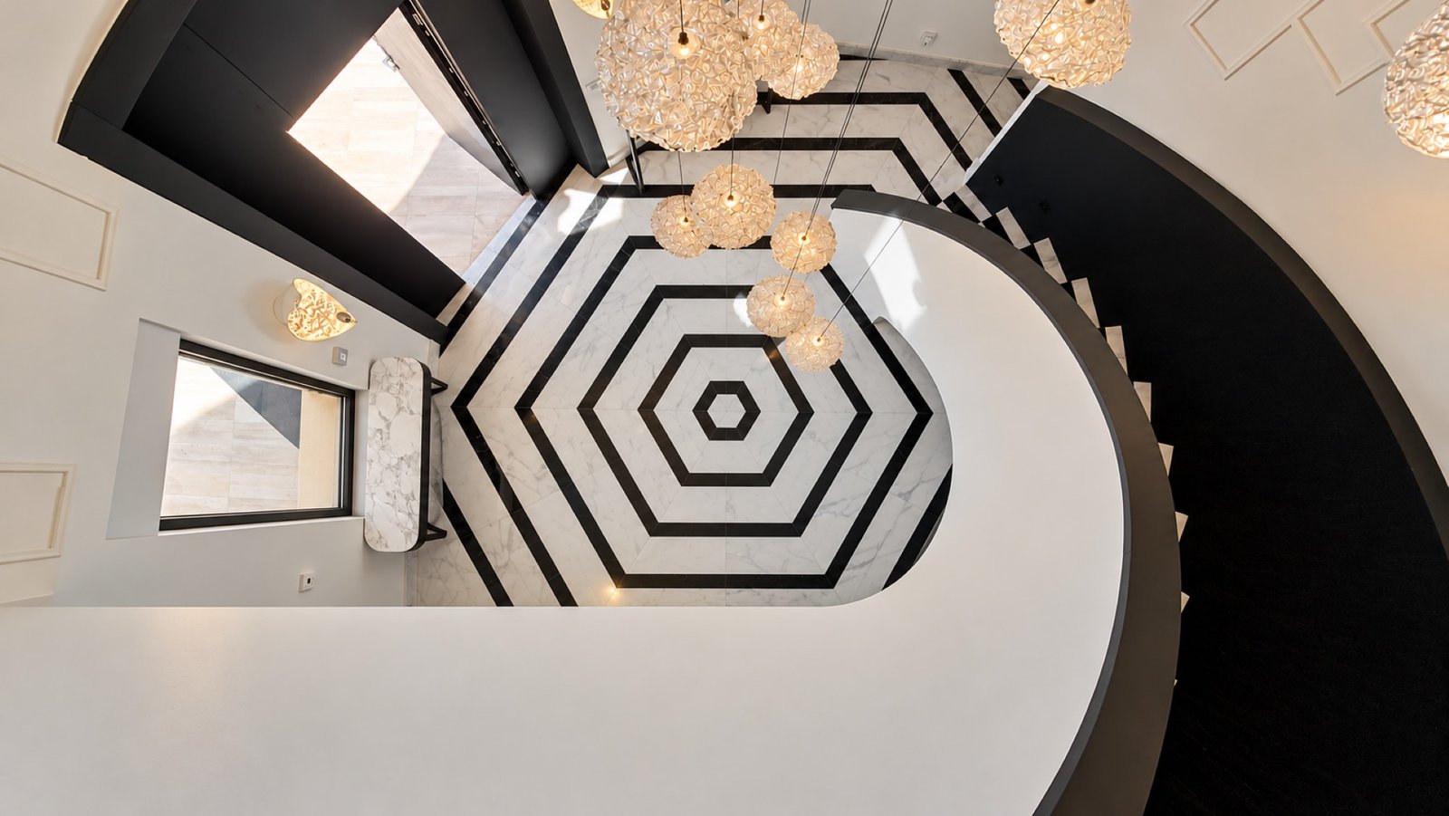 Entrance hall with Italian marble in a luxury home in Cap Blanc, Moraira